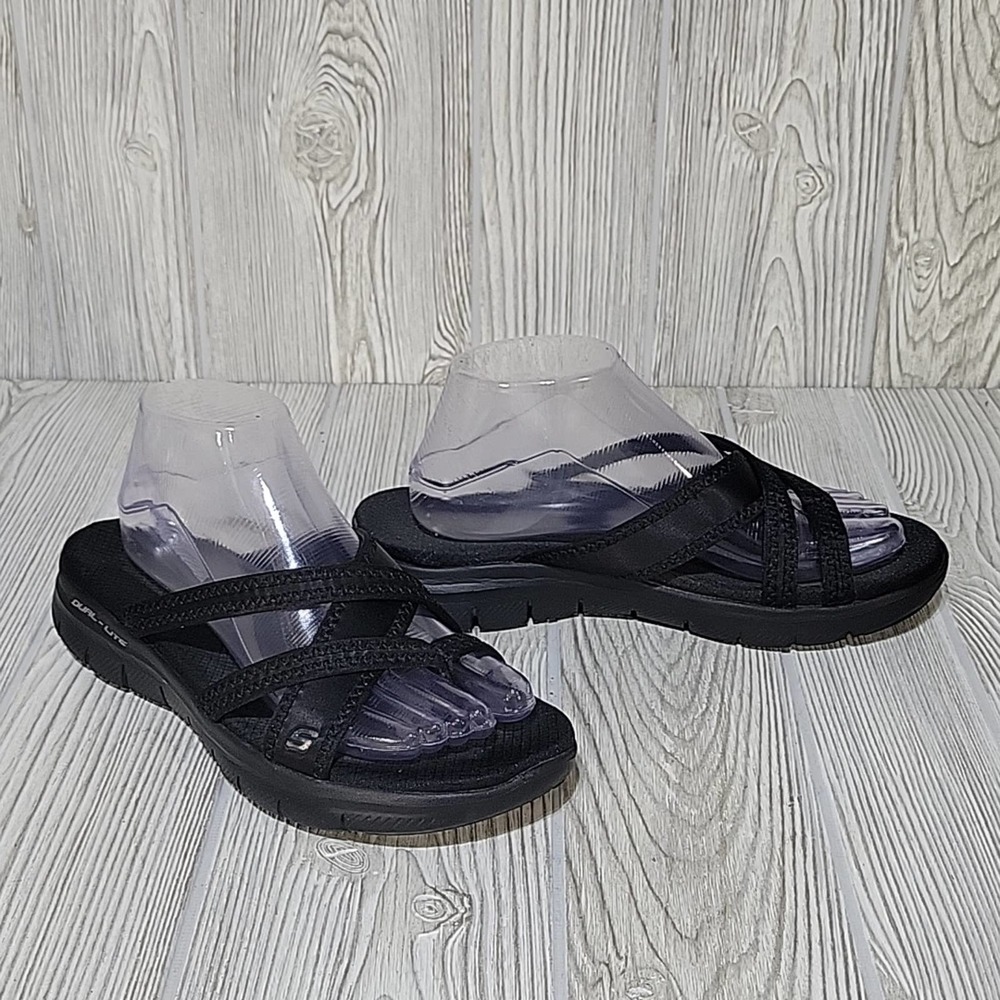Skechers Women's Flex black Sandals 9. Great shoes just a little big for me.